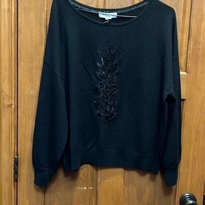 A new warm Tommy Bahama black top.